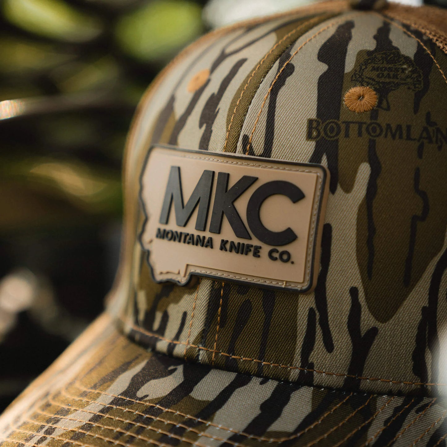 MKC X MOSSY OAK TRUCKER - BOTTOMLAND