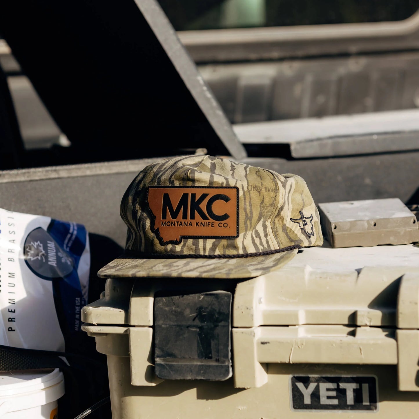 MKC X MOSSY OAK ROPE HAT - BOTTOMLAND