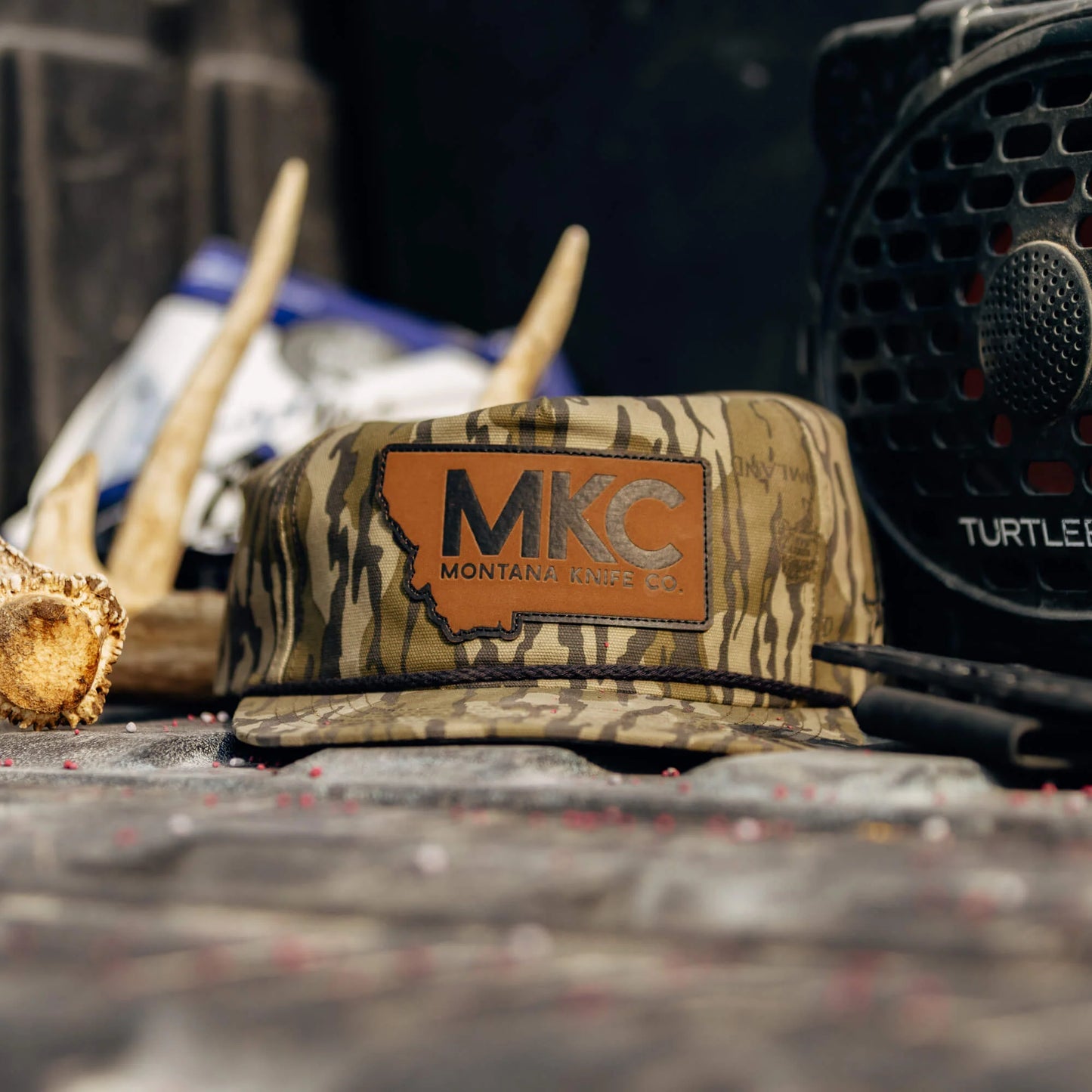 MKC X MOSSY OAK ROPE HAT - BOTTOMLAND