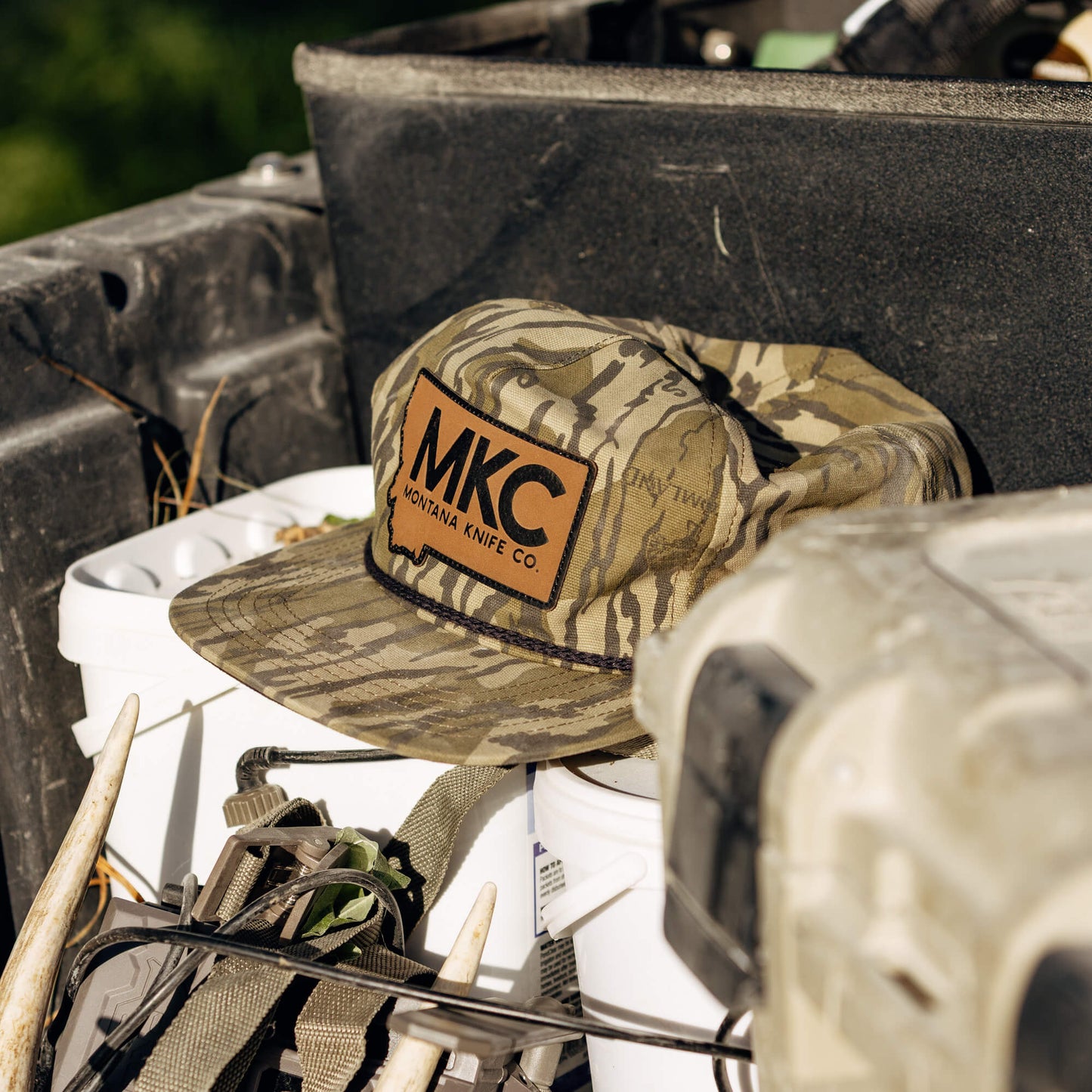 MKC X MOSSY OAK ROPE HAT - BOTTOMLAND